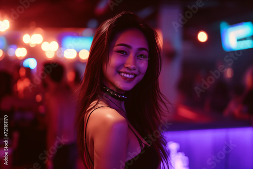 Glamourous Night Out: Pretty Asian Lady wearing choke chair and Low-Cut Black Dress at nightclub