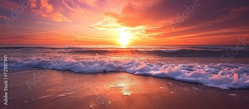 Stunning sunset beach scene with serene waves and captivating sky, perfect for meditation wallpaper. © 2rogan