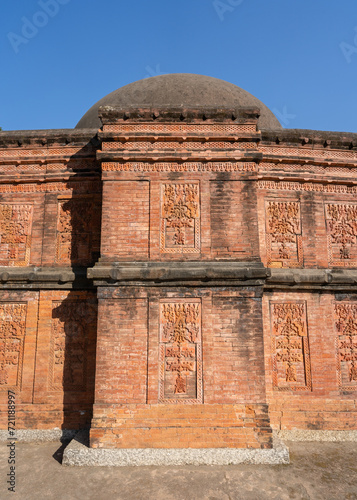Vertical view of brick and terracotta decor on back wall of ancient Sura mosque, Ghoraghat, Dinajpur, Bangladesh