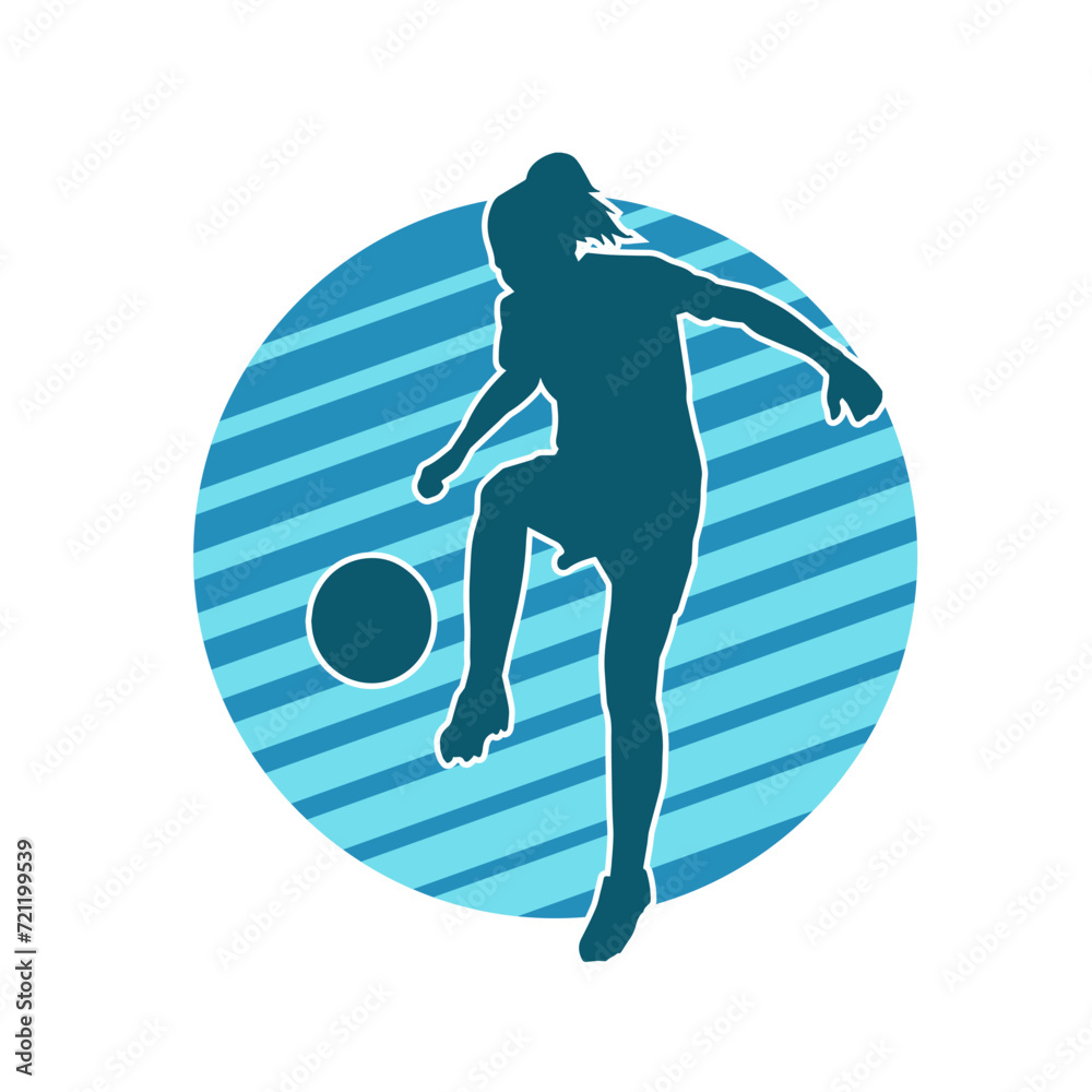 Silhouette of a female soccer player kicking a ball. Silhouette of a football player woman in action pose.