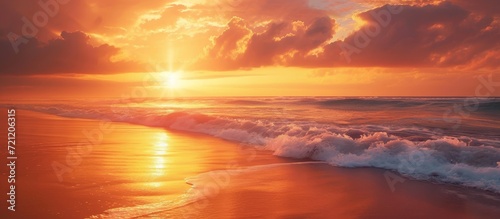 Breath-taking Sunset over a Serene Beach - A Captivating Sunset that Transforms the Beach into a Mesmerizing Haven