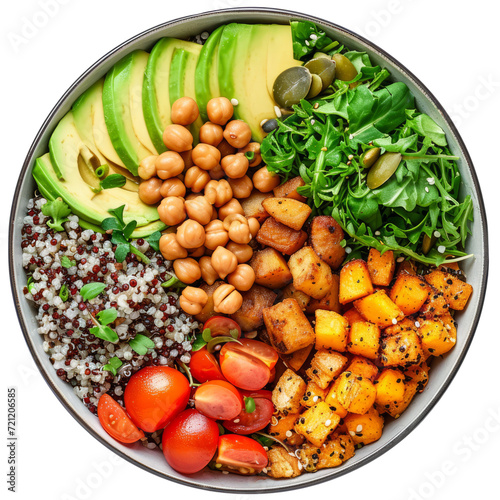 on top of a Buddha bowl  showcasing a nutritious assortment of quinoa  roasted vegetables  avocado and a dash of tahini for a healthy vegetarian food concept.