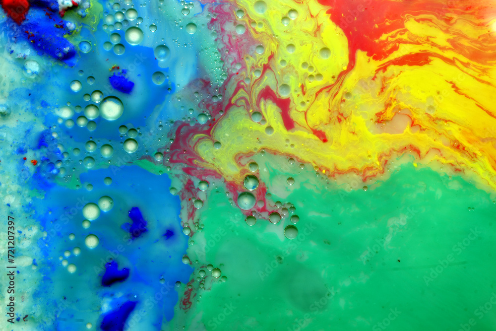A textured pattern created by paints diluted in a liquid with bubbles.