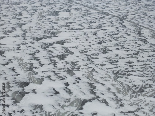 Wallpaper Mural View from above of the surface of the lake covered with ice in winter. Torontodigital.ca