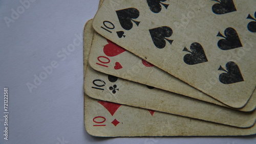 old tens playing card on table