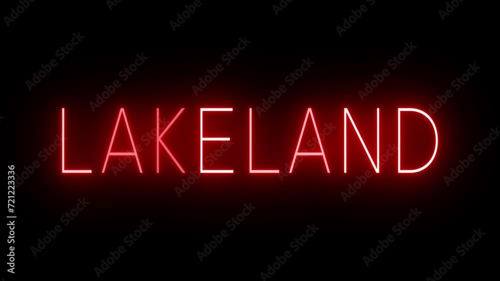 Flickering red retro style neon sign glowing against a black background for LAKELAND