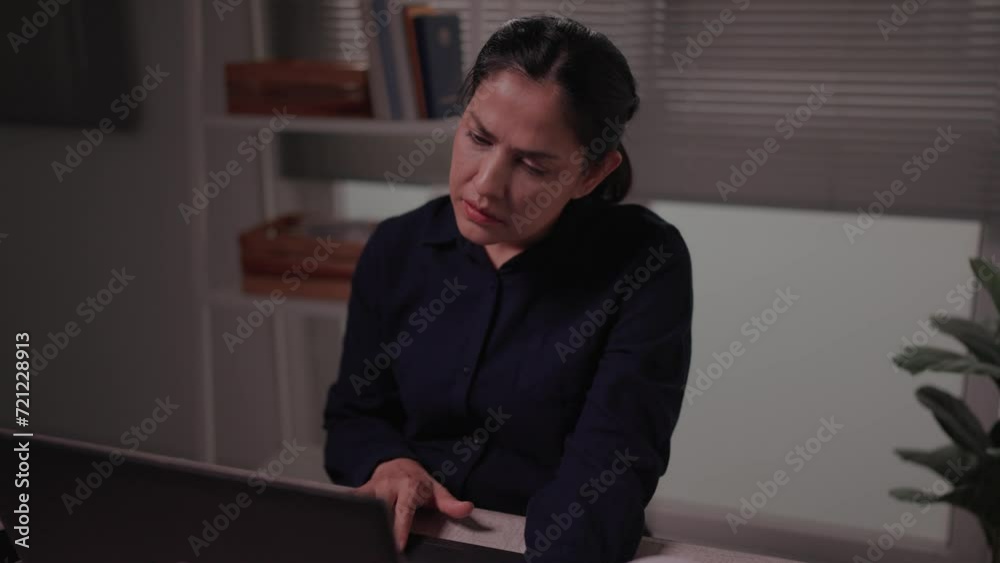 Woman reads emails on laptop at night, feels depressed after receiving bad news online Failed to pass professional exam Receive notification of termination Unemployment concept Woman reads emails on laptop at night, feels depressed after receiving bad news online Failed to pass professional exam Receive notification of termination Unemployment concept