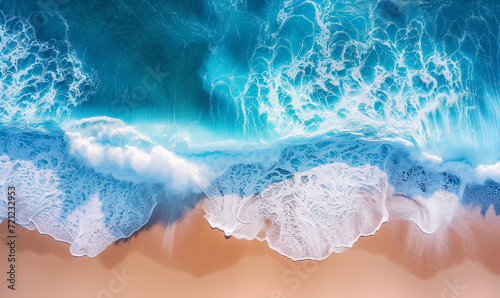 Ocean's Embrace: Aerial Perspective of the Shimmering Shoreline Where Waves Meet Sand in a Mesmerizing Dance, Top view with the drone