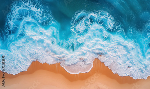 Ocean's Embrace: Aerial Perspective of the Shimmering Shoreline Where Waves Meet Sand in a Mesmerizing Dance, Top view with the drone © augenperspektive
