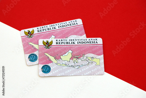 Indonesia child identity card Kartu Identitas Anak or KIA card. ID document for indonesian children close up photo