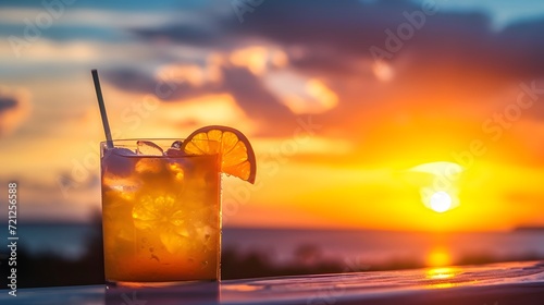 cocktail at the beach, a cocktail against a sunset, symbolizing leisure and hospitality