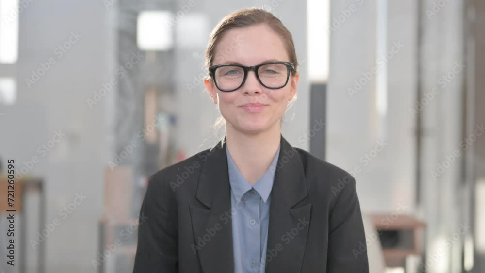 Portrait of Young Businesswoman with Thumbs Up Portrait of Young Businesswoman with Thumbs Up