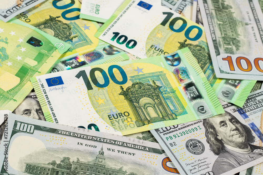Hundred dollars and euros bills. Finance concept background Hundred dollars and euros bills. Finance concept background