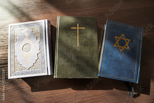 Quran, Bible, Talmud or Torah, religion concept photo