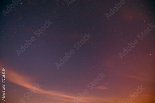Warm colors background Real sunset Night Sky Stars. Natural Starry Sky Background.