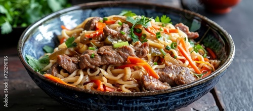Delicious Meat, Vibrant Vegetables, and Satisfying Noodles: A Mouthwatering Combination of Meat, Vegetables, and Noodles in One Irresistible Dish