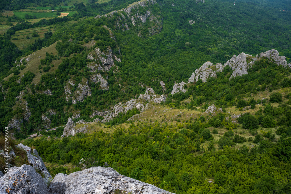 Jelasnicka Klisura and the view from the Prozorac lookout point on the huge rocks and meadows that spread across the mountain (Jelasnica Klisura, Suva planina).