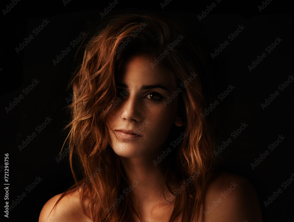 Woman, hair care and ginger with portrait, cosmetic and shampoo treatment in a studio. Salon, beauty and female person with wavy texture and fresh haircut with balayage coloring with black background