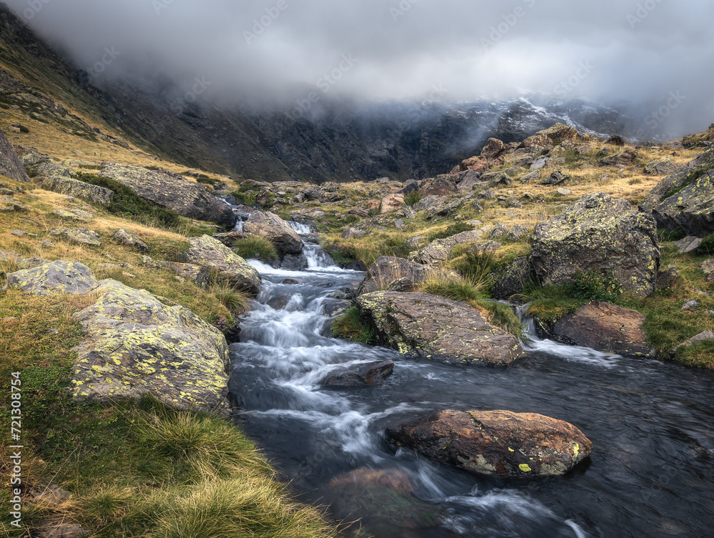 Water Stream at Tristaina Lakes in the Pyrenees, Andorra Water Stream at Tristaina Lakes in the Pyrenees, Andorra