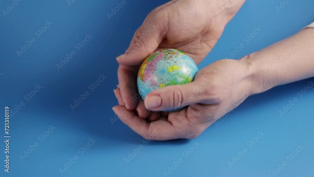 Globe in hands, nature conservation, global responsibility, environmental unity Globe in hands, nature conservation, global responsibility, environmental unity