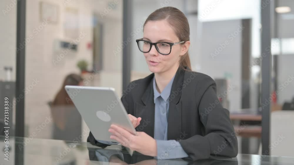 Online Video Chat by Businesswoman via Tablet Online Video Chat by Businesswoman via Tablet