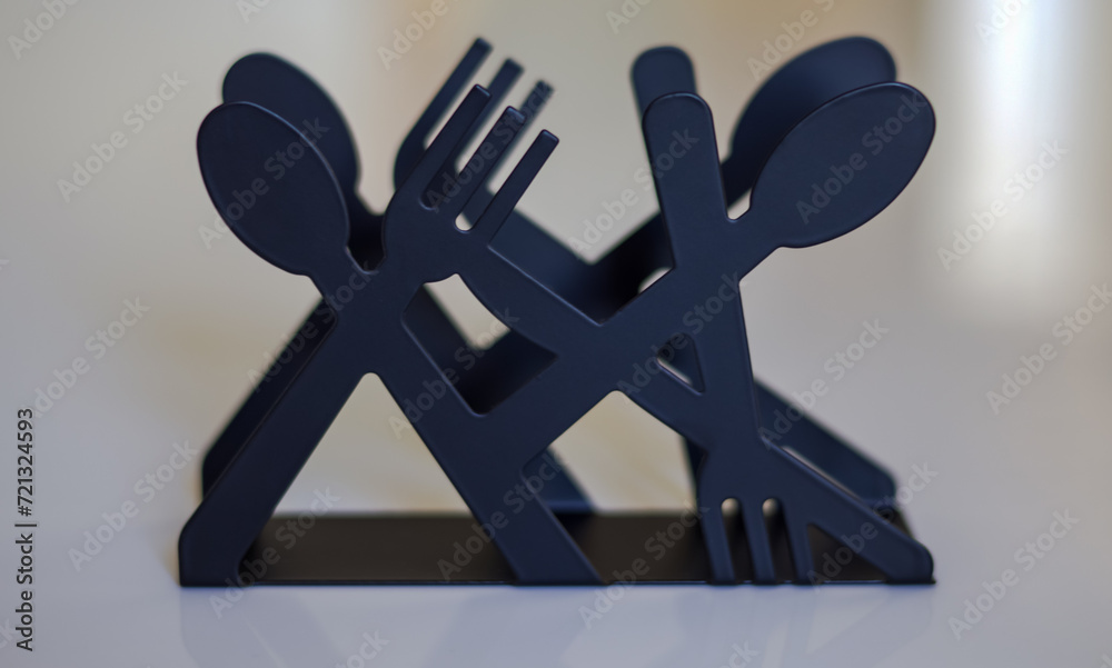 Fototapeta premium fork and spoon on blue