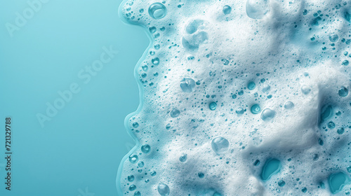spot of thick shampoo foam on a blue background photo