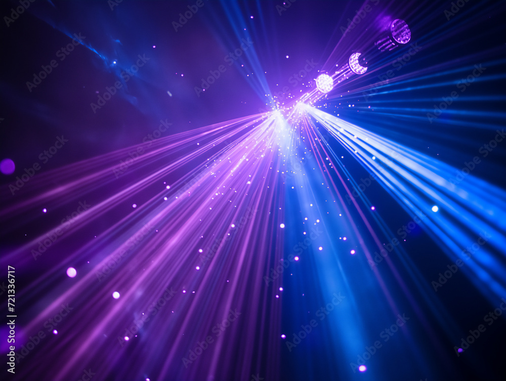 Blue and violet beams of bright laser light with black background.