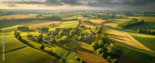 An aerial perspective of vast farmland stretching into the distance. photo