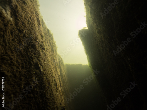 Gap between steep cliffs underwater