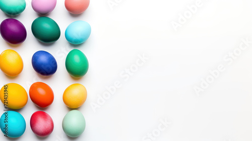 Colorful Easter eggs isolated on white background. Chocolate glazed eggs. Top view. Three rows of colorful eggs on white with space for text. For postcards, covers, doughs, games.