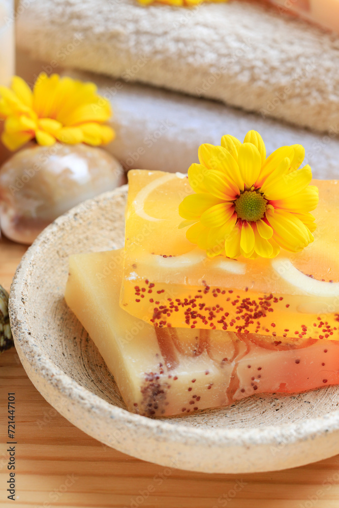 Handmade bars of spa soap collected as a stack.