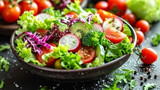vibrant bowl of salad with various fresh vegetables like lettuce, tomatoes, cucumbers, and broccoli, sprinkled with herbs on a dark background