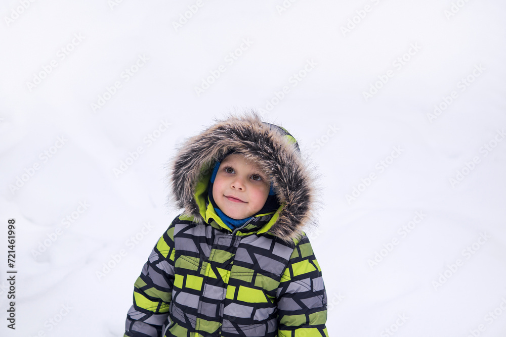 smiling child walking in snowy winter smiling child walking in snowy winter
