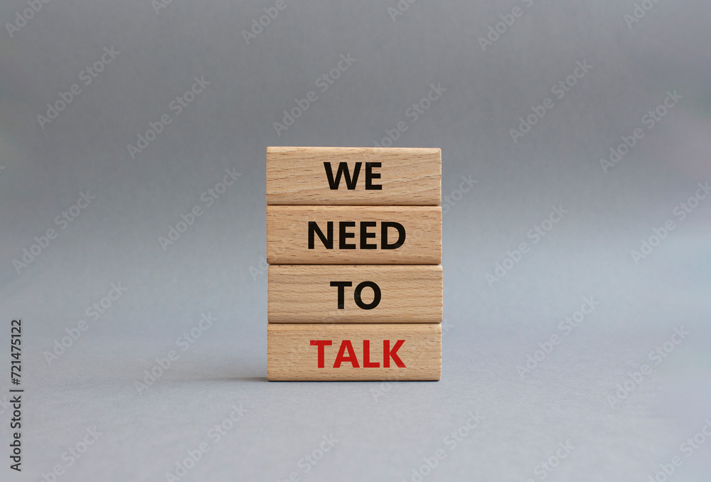 We need to talk symbol. Concept words We need to talk on wooden blocks. Beautiful grey background. Business and We need to talk concept. Copy space. We need to talk symbol. Concept words We need to talk on wooden blocks. Beautiful grey background. Business and We need to talk concept. Copy space.