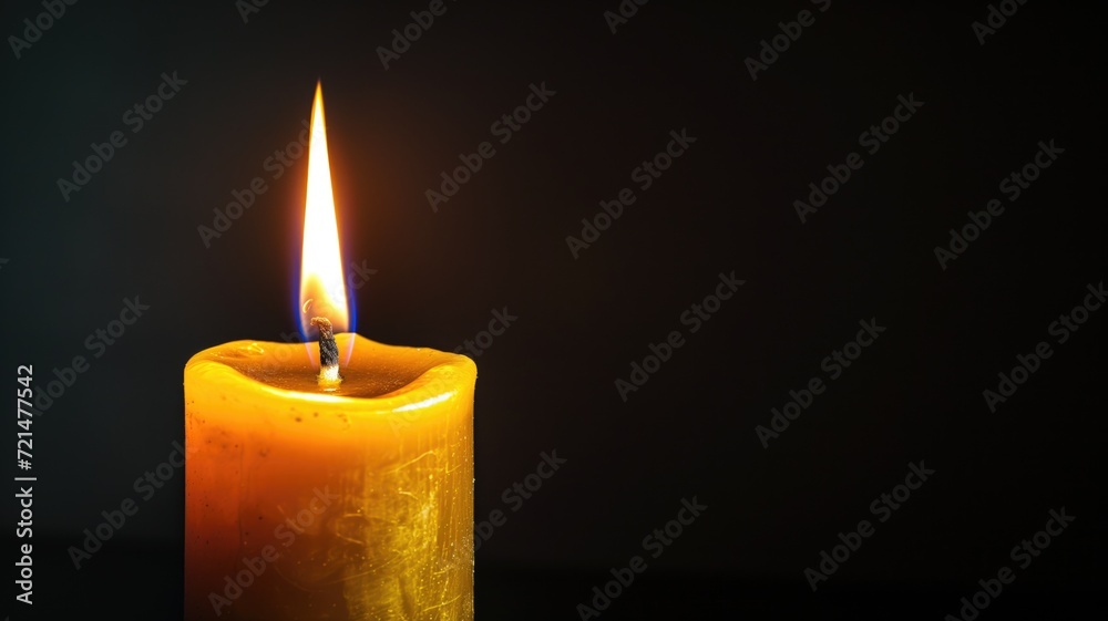 A single lit candle glowing in the dark, tranquil ambiance A single lit candle glowing in the dark, tranquil ambiance
