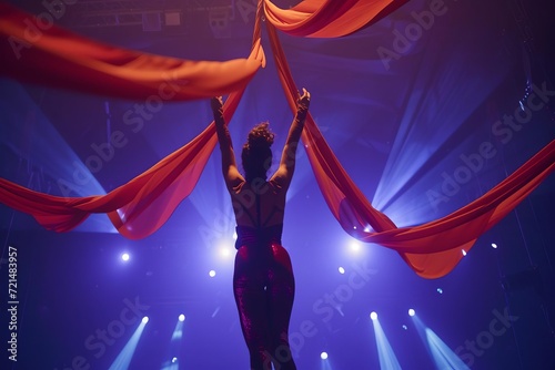 Dynamic aerial acrobatics show with silks and daring performers photo