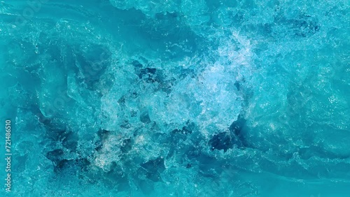 swirl in clear water. top view of choppy water. 3d animation of a swirl in water.  underwater explosion creates a whirlpool photo