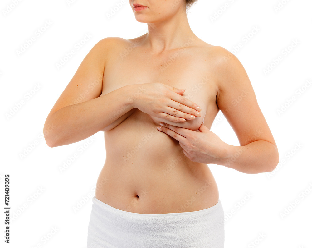 Woman examining her breast isolated on white background
Woman examining her breast isolated on white background