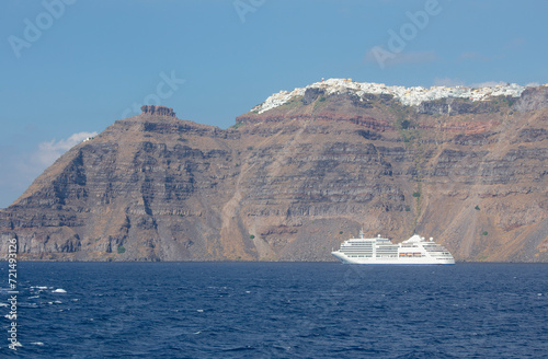 Santorini - The cliffs of calera with the cruises withe the Imerovigli and Skaros in the background.