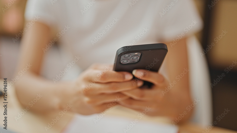 African american woman ecommerce business worker using smartphone at office