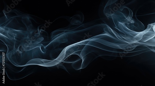 Close-up image of smoke on a black background. Perfect for adding a mysterious or dramatic touch to design projects