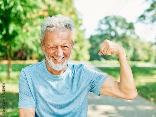 man muscle strength bicep  fitness senior strong arm muscular power training fit mature healthy body exercise confident macho motivation fun flexing