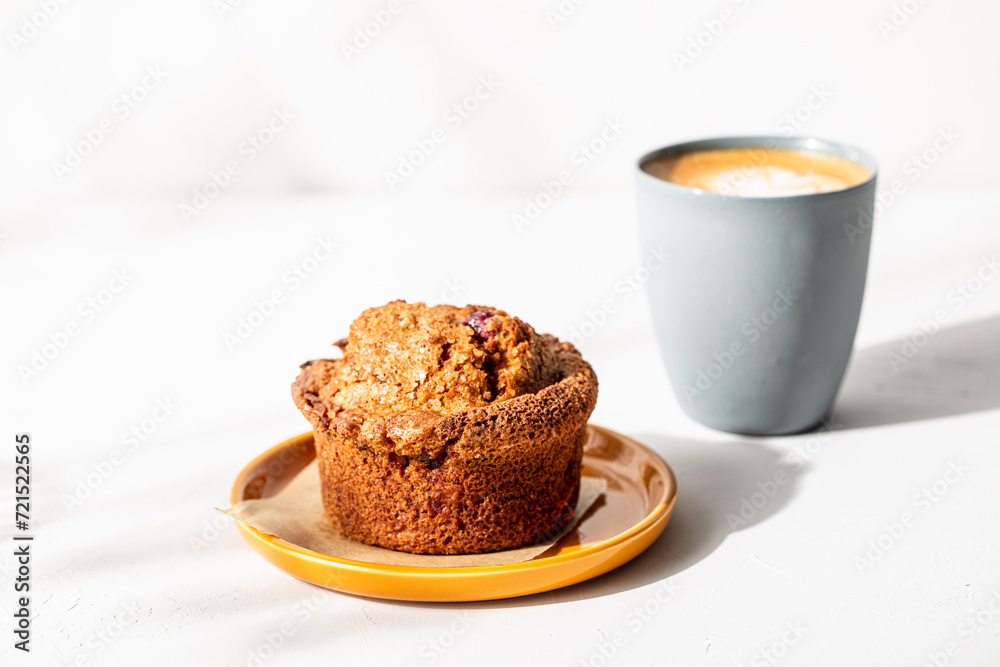 Organic pastries and coffee on white plaster surface
Organic pastries and coffee on white plaster surface