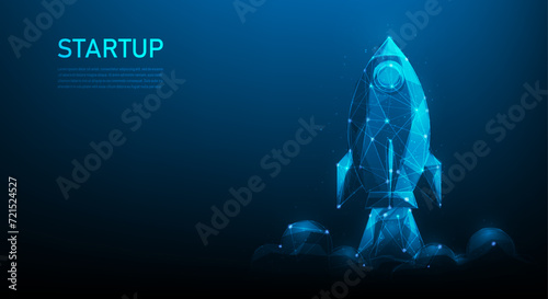 business startup rocket launching digital technology on blue background. new business fast growth to success. vector illustration low poly wireframe design. photo