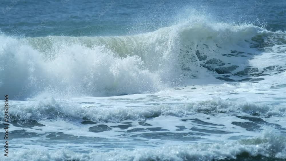 Ocean waves break in Brazilian shore Ocean waves break in Brazilian shore