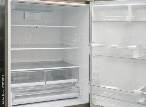 empty refrigerator with door open
