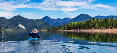 Kayaking in Canadian Mountain Landscape lake