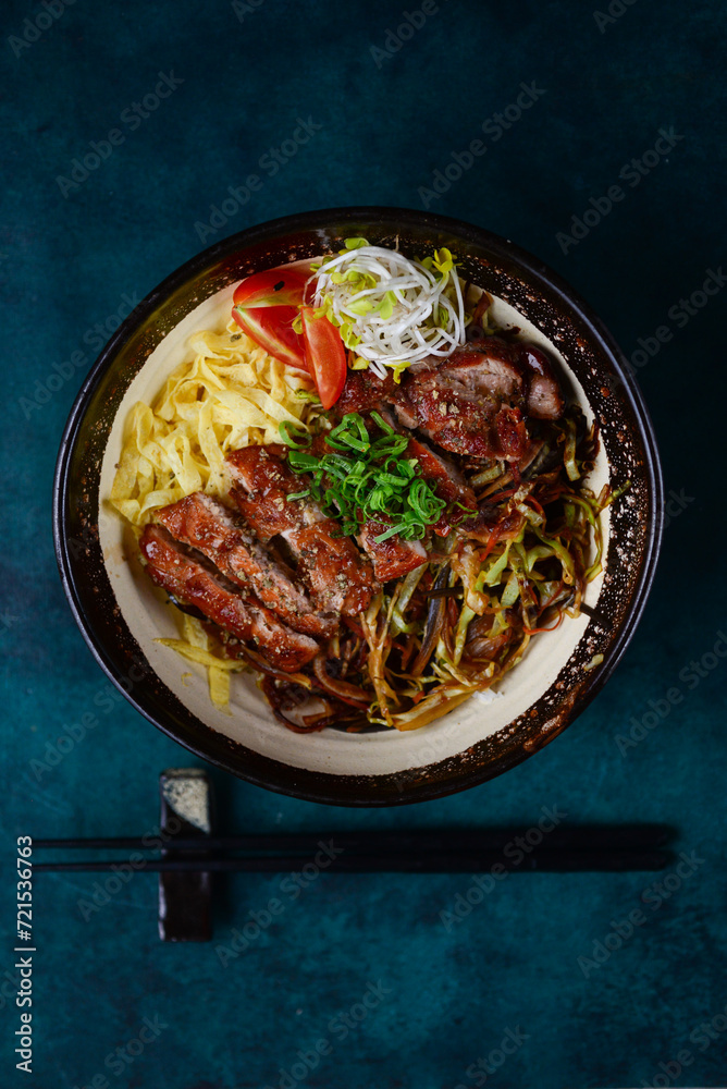 beef with vegetables on a plate with chopsticks beef with vegetables on a plate with chopsticks