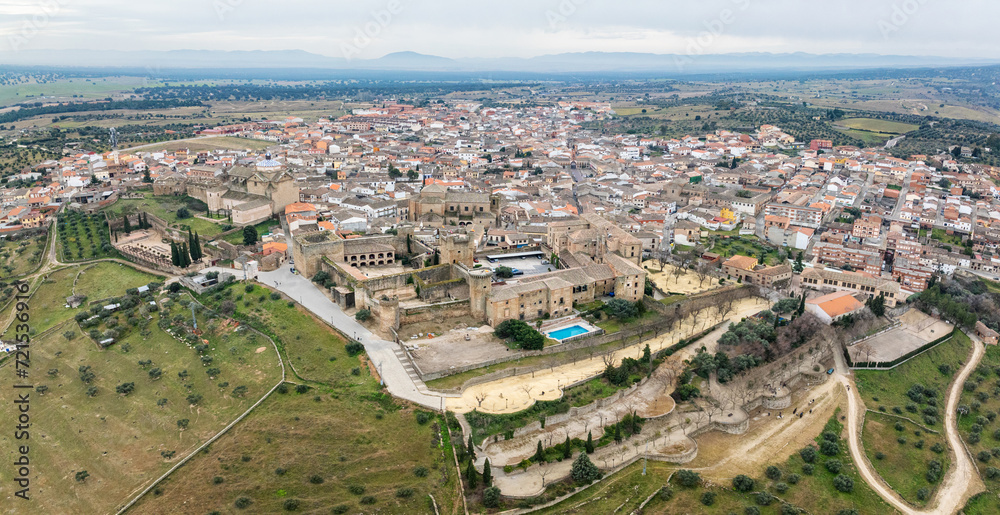 Aerial view of the Spanish town of Oropesa in Toledo, with its famous Parador in the foreground.